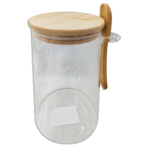 Frasco de vidrio con cuchara y tapa de madera